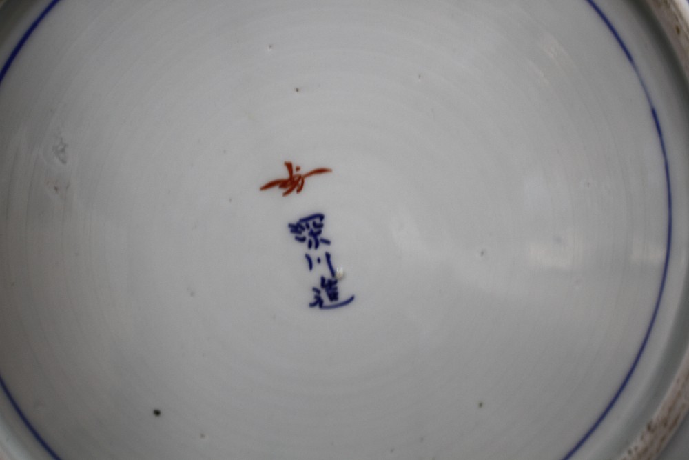 A Japanese Arita squared porcelain dish, decorated with water plants and a Kingfisher, signed, 31 x 31cm, height 4.5cm